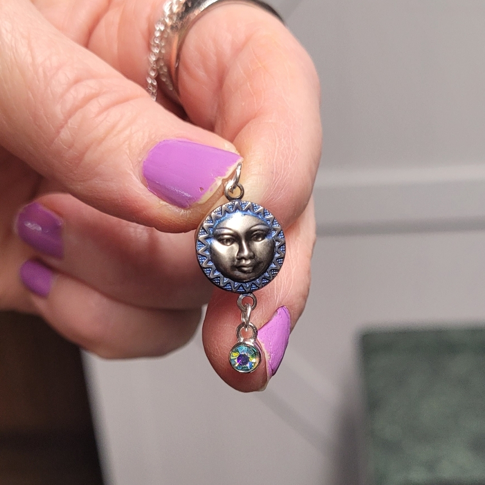 Artistic Silver and Blue Moon Face Necklace